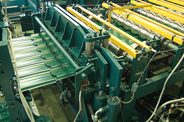 Urządzenie znaczek для автоматической линии по производству металлочерепицы